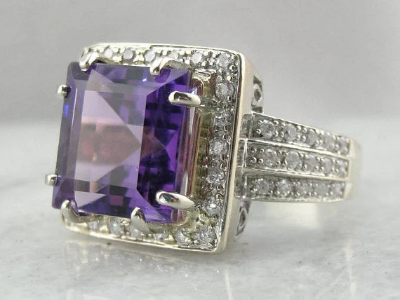 Women’s silver engagement ring-Contemporary Luxury: Weighty White Gold and Diamond Mounting with Rare Amethyst Center