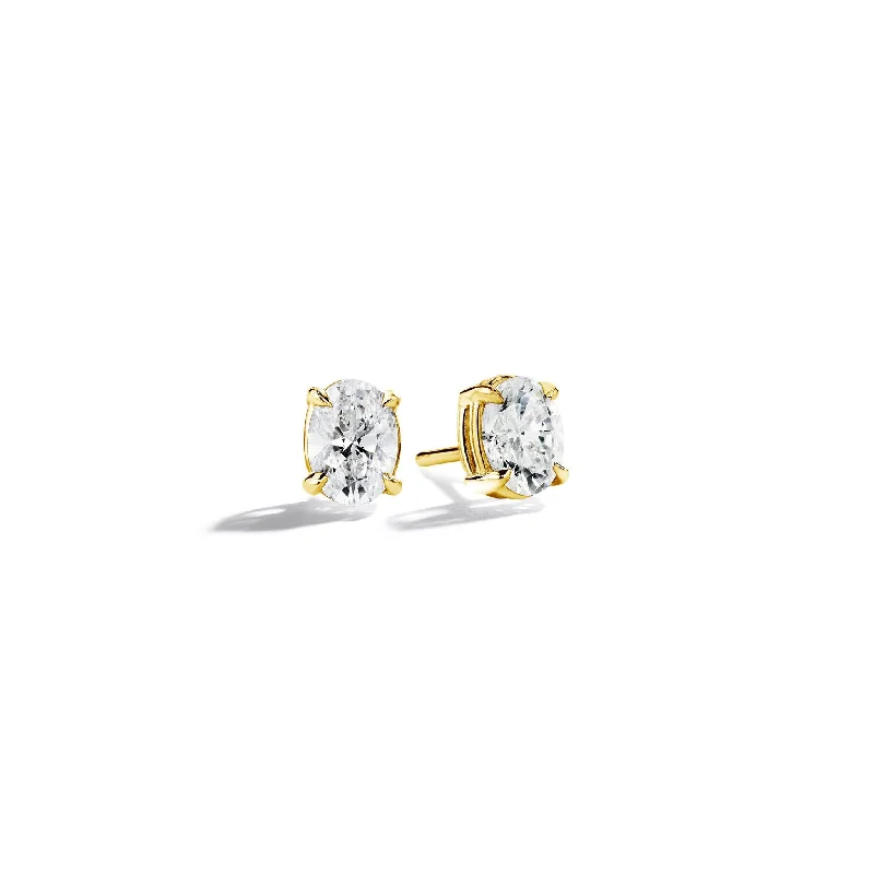 Women’s stud earrings-Oval Cut Diamond Studs