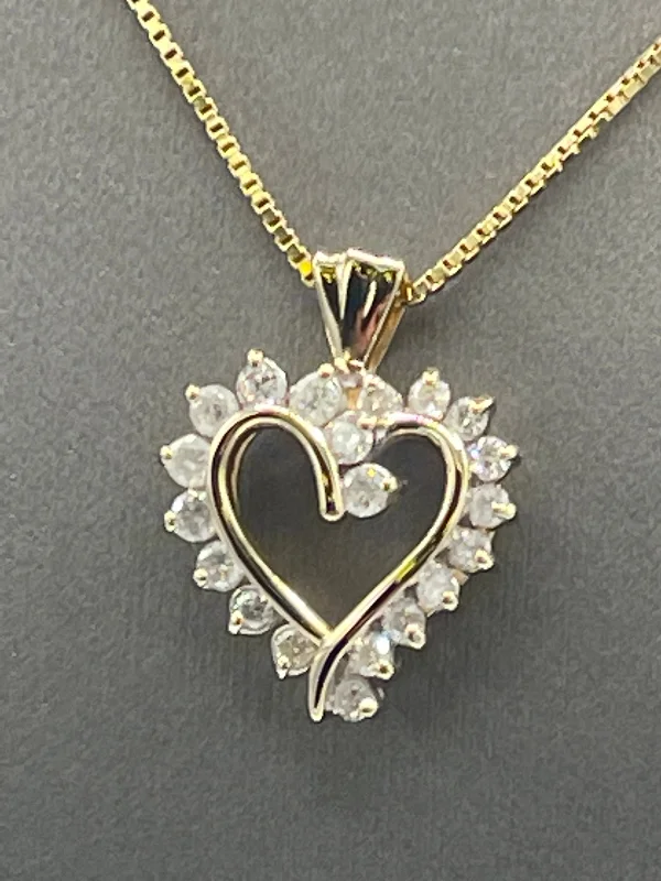 Women’s handcrafted necklace-A Ladies Gorgeous 14 Karat Yellow Gold Diamond Heart pendant