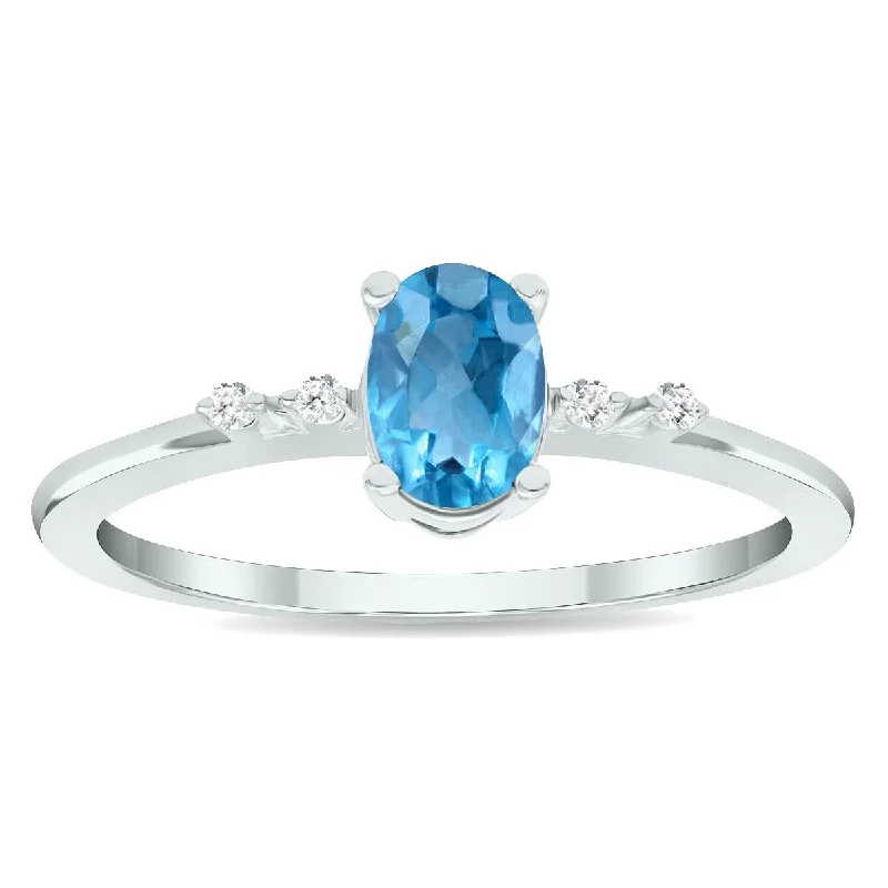 Women’s fancy ring-Women's Blue Topaz and Diamond Sparkle Ring in 10K White Gold