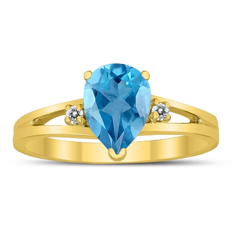 Women’s emerald-cut ring-8X6MM Blue Topaz and Diamond Pear Shaped Open Three Stone Ring in 10K Yellow Gold