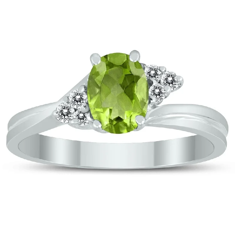 Women’s oval ring-7X5MM Peridot and Diamond Twist Ring in 10K White Gold