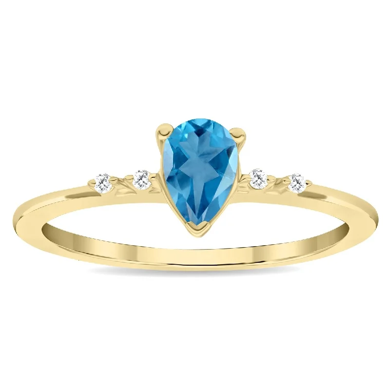 Women’s sapphire ring-Women's Pear Shaped Blue Topaz and Diamond Sparkle Ring in 10K Yellow Gold