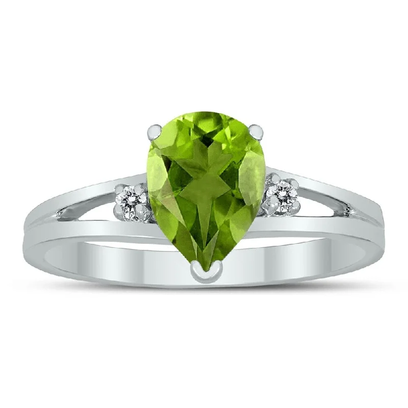 Women’s statement ring-8X6MM Peridot and Diamond Pear Shaped Open Three Stone Ring in 10K White Gold