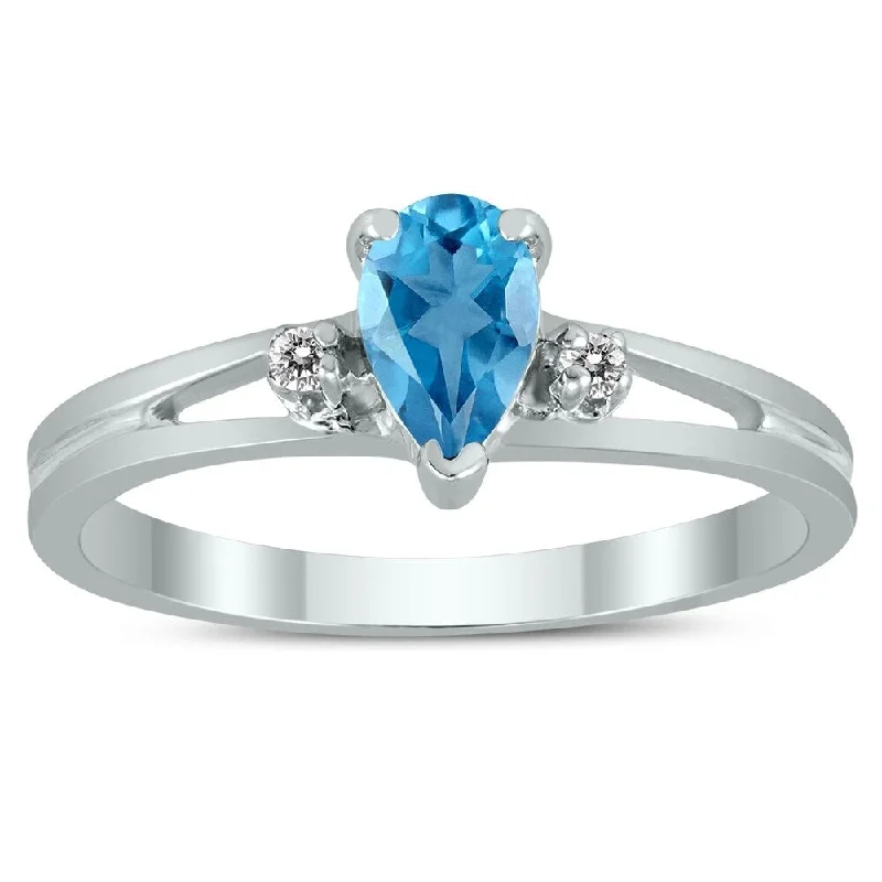 Women’s heart-shaped ring-6X4MM Blue Topaz and Diamond Pear Shaped Open Three Stone Ring in 10K White Gold