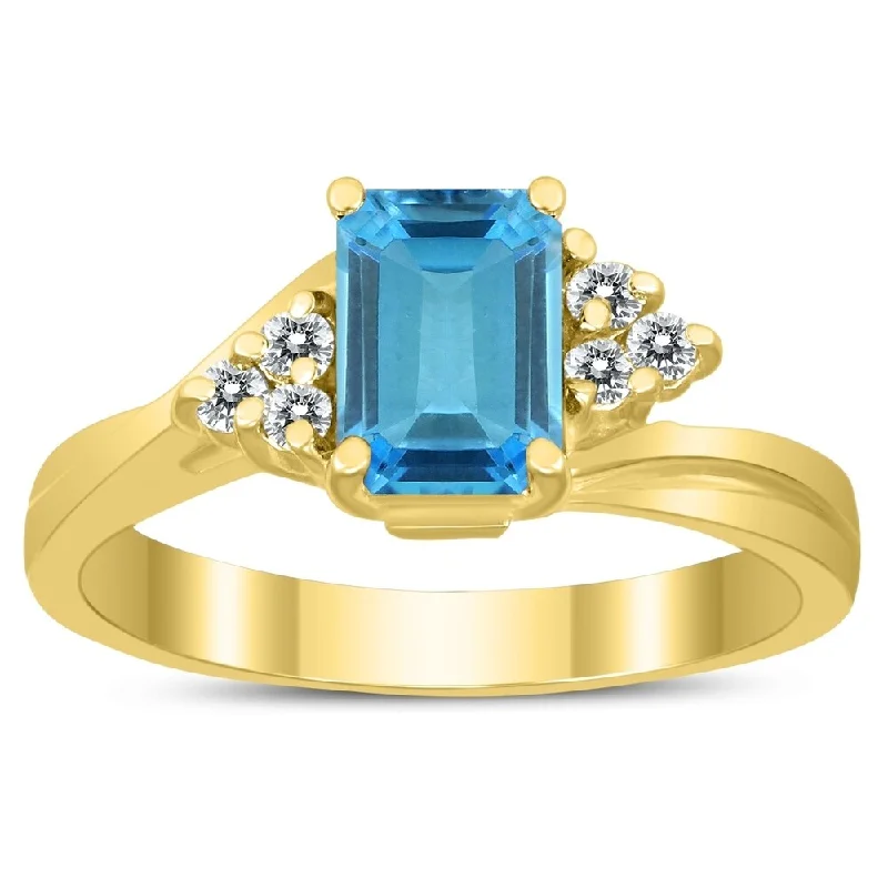 Women’s luxury ring-7X5MM Blue Topaz and Diamond Twist Ring in 10K Yellow Gold