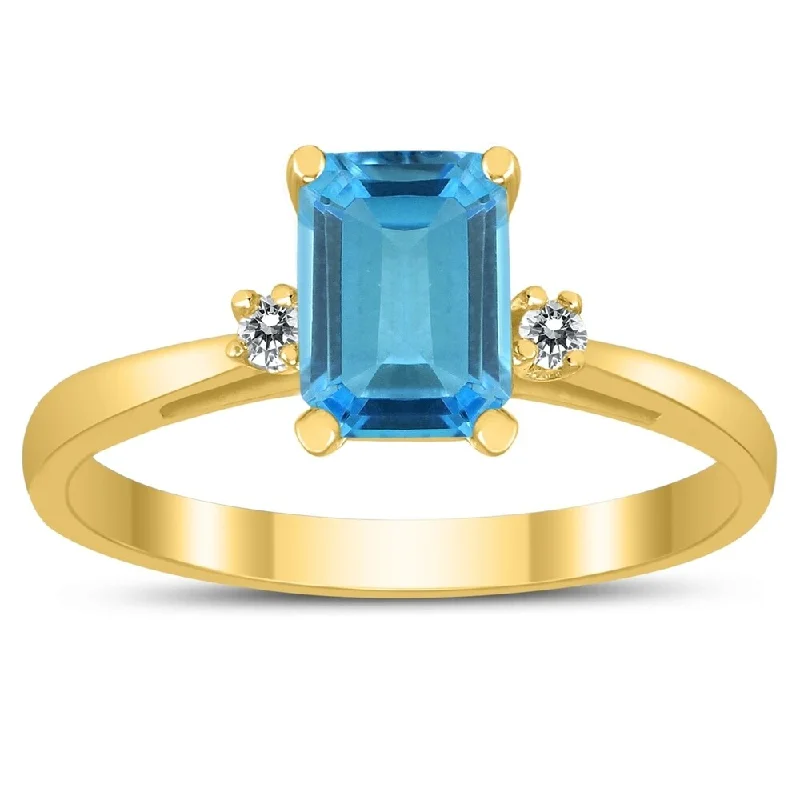 Women’s engraved ring-Emerald Cut 7X5MM Blue Topaz and Diamond Three Stone Ring in 10K Yellow Gold