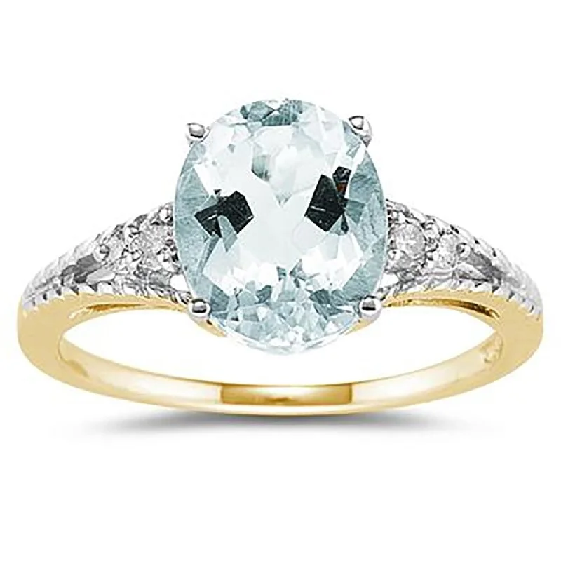 Women’s minimalist ring-Oval Cut Aquamarine & Diamond Ring in 14k Yellow Gold