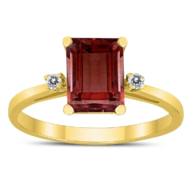 Women’s intricate ring-Emerald Cut 8X6MM Garnet and Diamond Three Stone Ring in 10K Yellow Gold