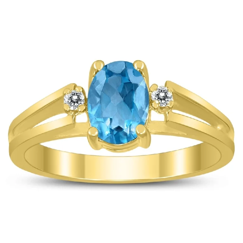 Women’s emerald ring-7X5MM Blue Topaz and Diamond Open Three Stone Ring in 10K Yellow Gold