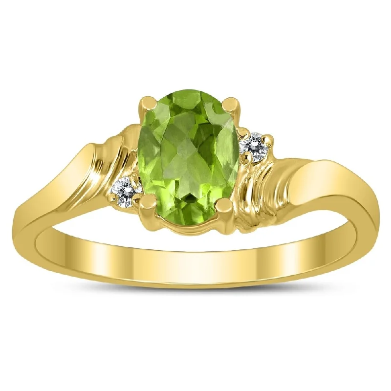 Women’s fancy ring-7X5MM Peridot and Diamond Wave Ring in 10K Yellow Gold