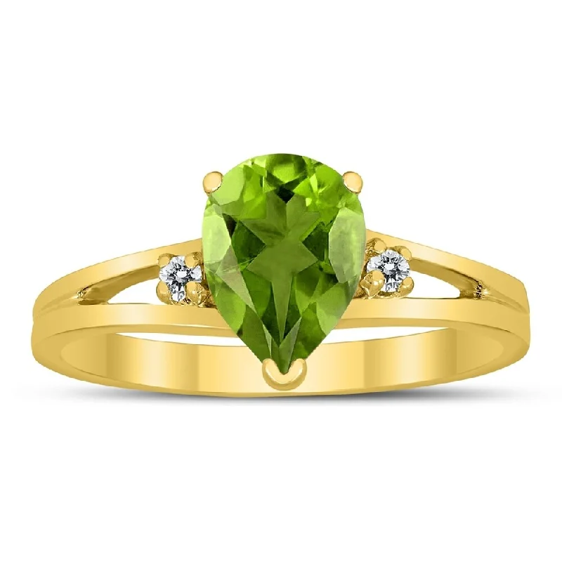 Women’s silver ring-8X6MM Peridot and Diamond Pear Shaped Open Three Stone Ring in 10K Yellow Gold