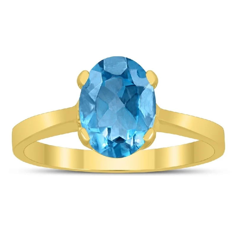 Women’s modern diamond ring-Oval Solitaire 8X6MM Blue Topaz Ring in 10K Yellow Gold