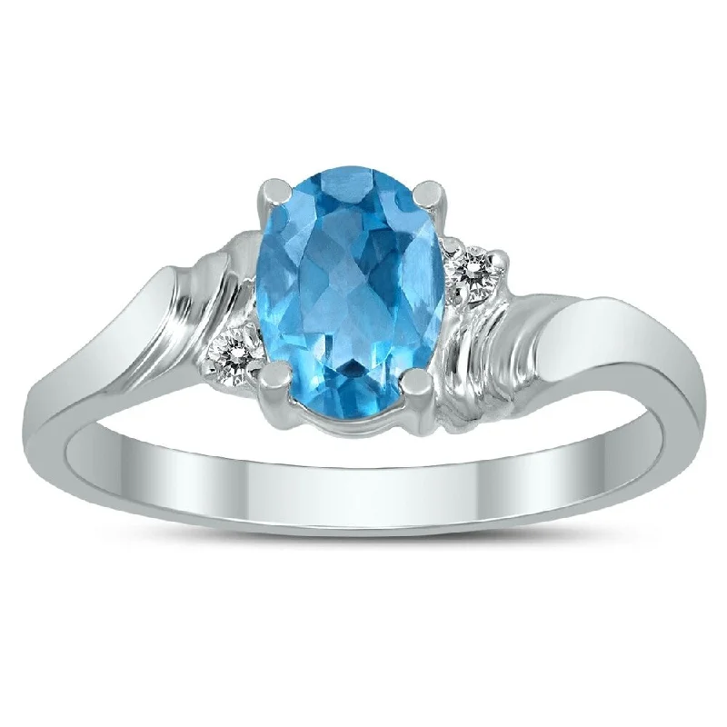 Women’s emerald ring-7X5MM Blue Topaz and Diamond Wave Ring in 10K White Gold