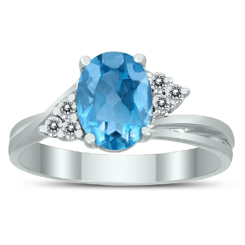 Women’s emerald and diamond ring-8X6MM Blue Topaz and Diamond Twist Ring in 10K White Gold