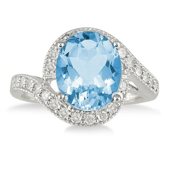 Women’s ruby ring-5 Carat Oval Blue Topaz and Diamond Ring in 10K White Gold