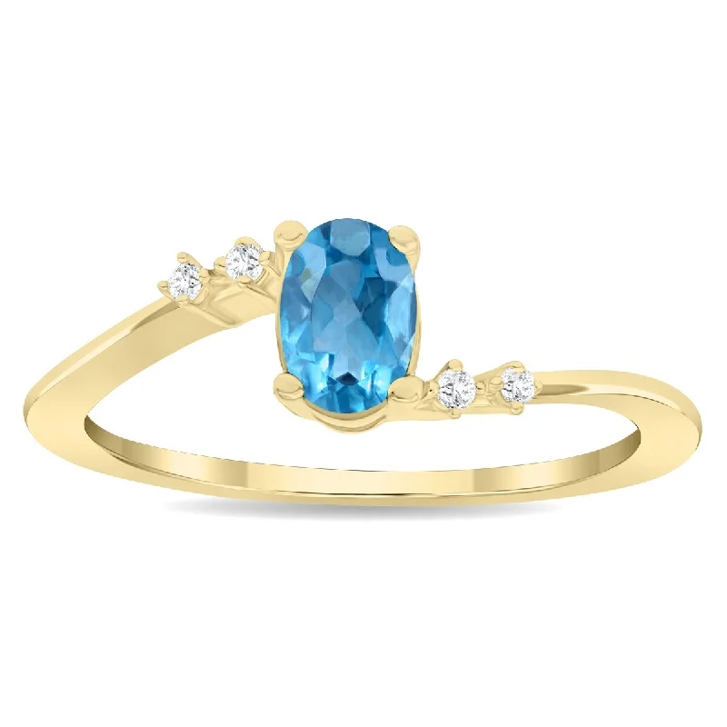 Women’s vintage-inspired ring-Women's Oval Shaped Blue Topaz and Diamond Tierra Ring in 10K Yellow Gold