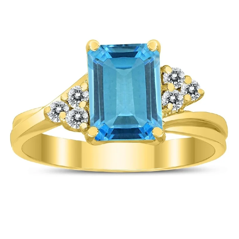 Women’s classic ring-8X6MM Blue Topaz and Diamond Twist Ring in 10K Yellow Gold