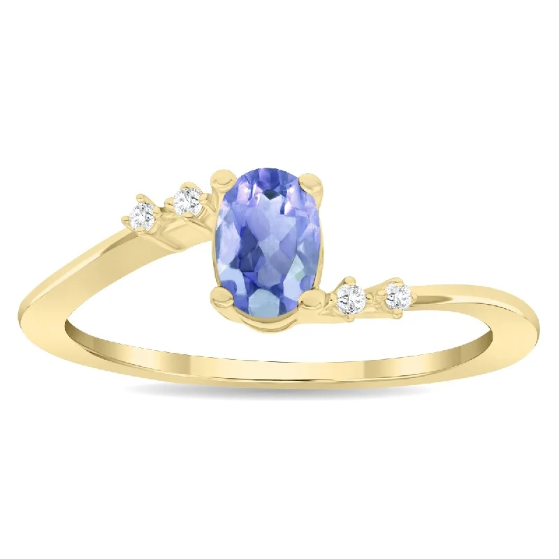 Women’s wedding ring with diamonds-Women's Oval Shaped Tanzanite and Diamond Tierra Ring in 10K Yellow Gold