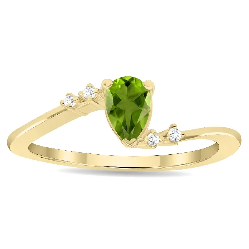 Women’s oval ring-Women's Pear Shaped Peridot and Diamond Wave Ring in 10K Yellow Gold