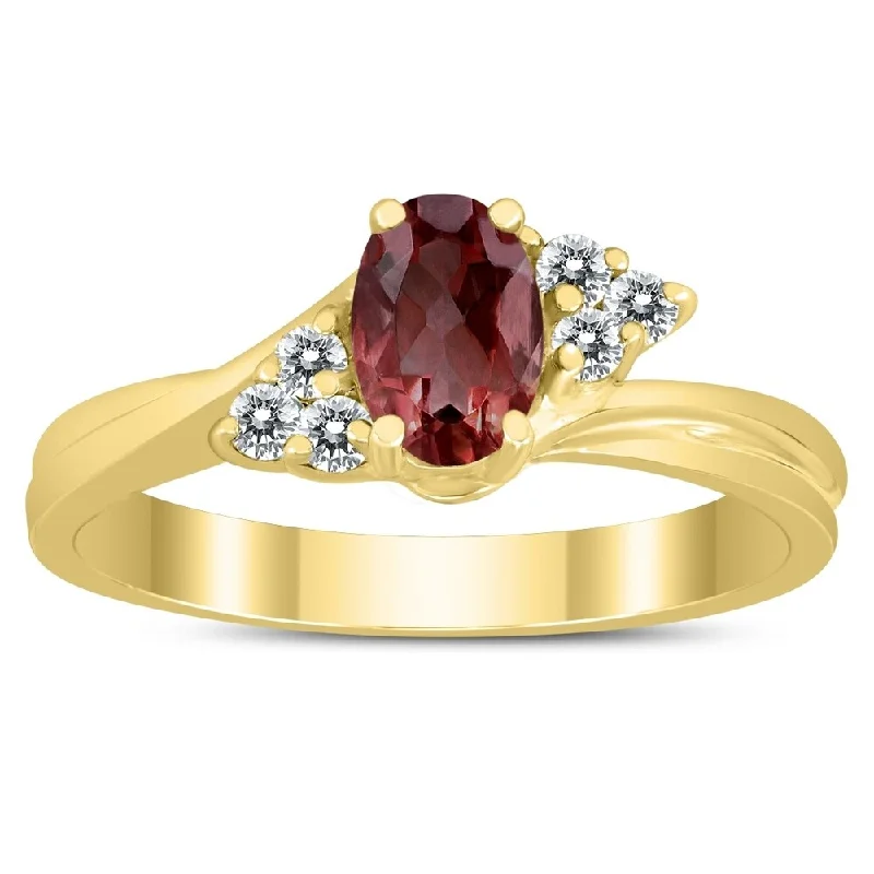 Women’s engraved wedding ring-6X4MM Garnet and Diamond Twist Ring in 10K Yellow Gold