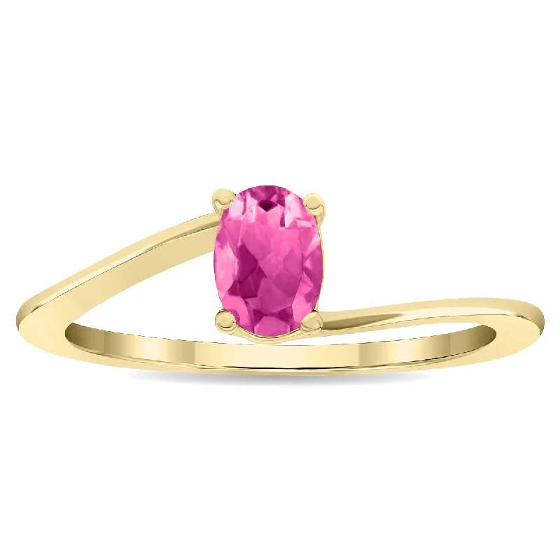 Women’s classic wedding ring-Women's Solitaire Oval Shaped Pink Topaz Wave Ring in 10K Yellow Gold