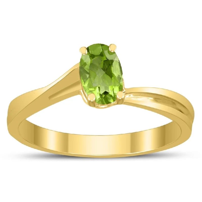 Women’s oversized ring-Solitaire Oval 6X4MM Peridot Gemstone Twist Ring in 10K Yellow Gold