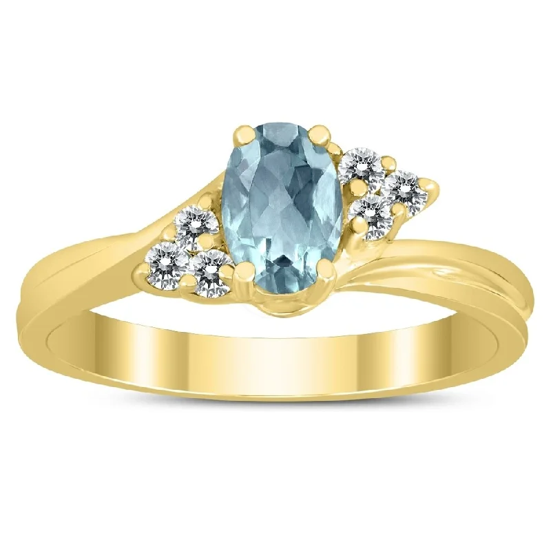 Women’s gold band ring-6X4MM Aquamarine and Diamond Twist Ring in 10K Yellow Gold