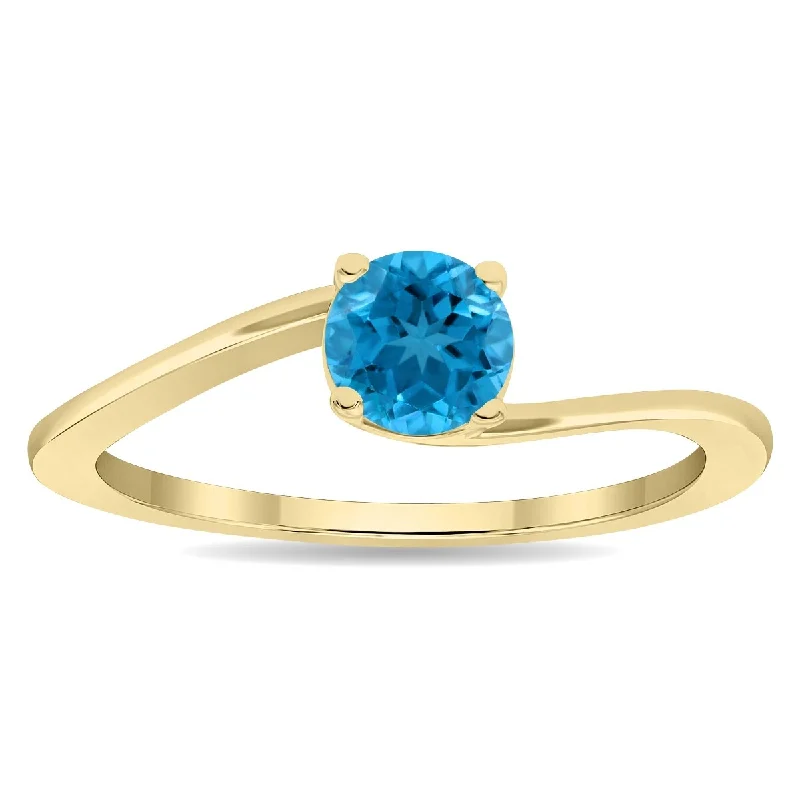 Women’s intricate ring-Women's Round Shaped Solitaire Blue Topaz Wave Ring in 10K Yellow Gold