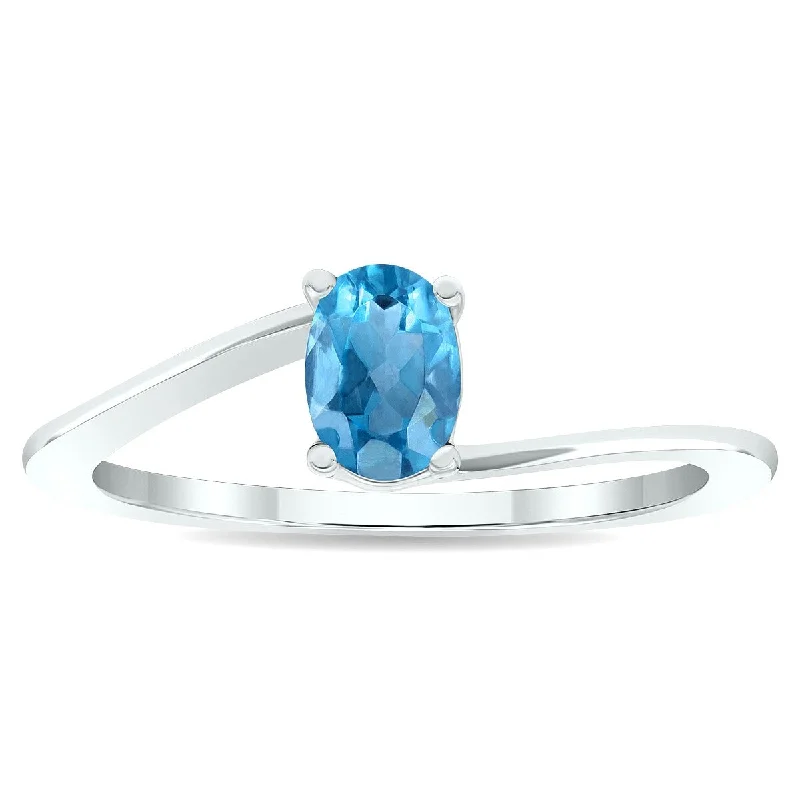 Women’s gemstone wedding ring-Women's Solitaire Blue Topaz Wave Ring in 10K White Gold