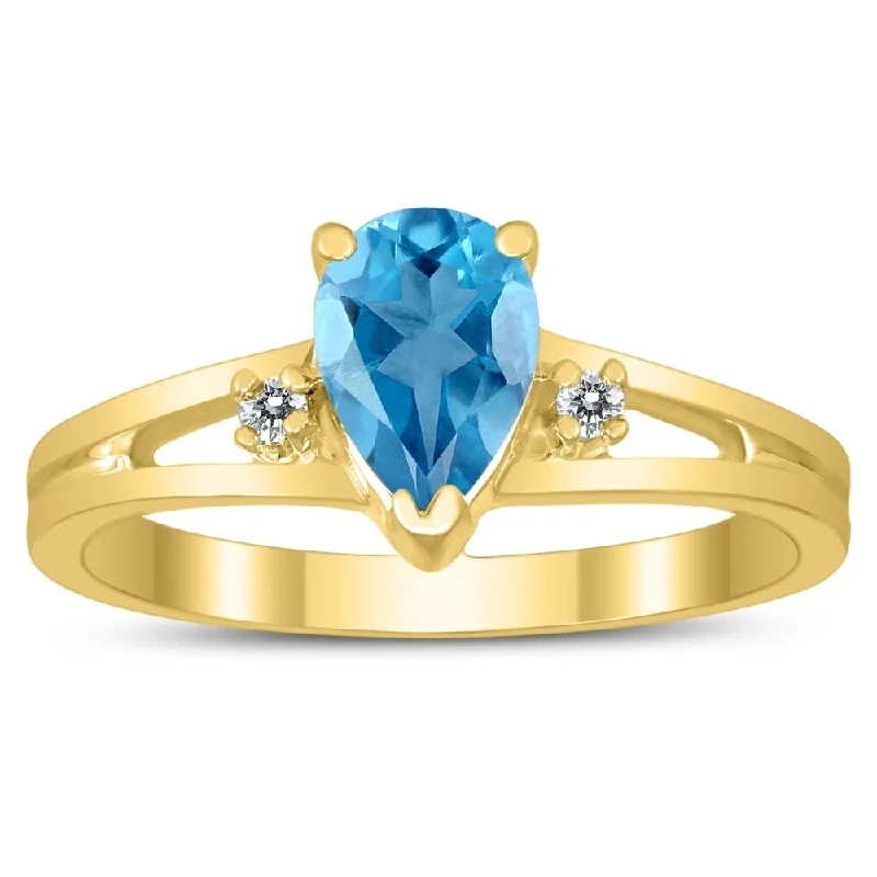 Women’s chic ring-7X5MM Blue Topaz and Diamond Pear Shaped Open Three Stone Ring in 10K Yellow Gold